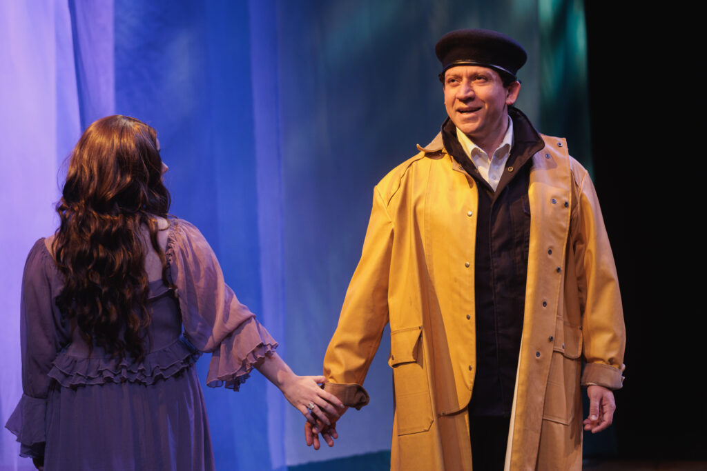 Davey (in raincoat) and Diana dance